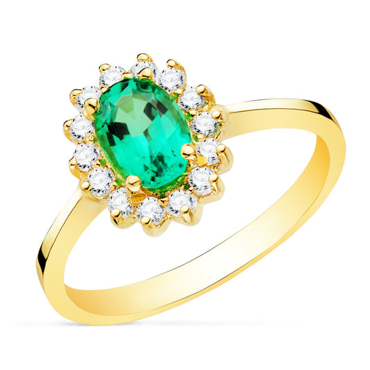 Oval emerald ring: 18kt yellow gold 0.75ct emerald and 0.29ct diamonds