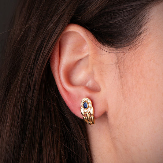 Panter sapphire earrings: 18 kt yellow gold