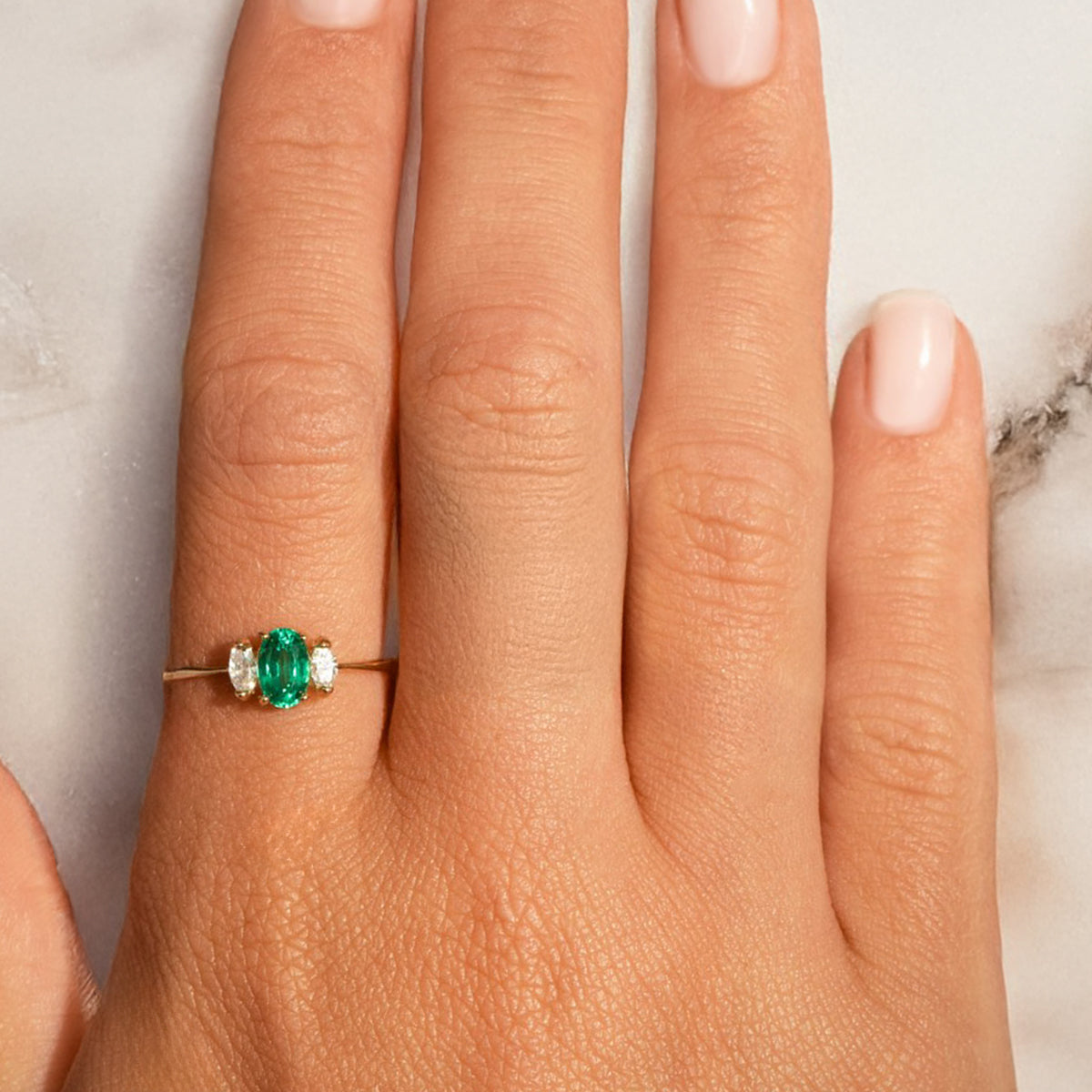 Trieny ring: 18 kt yellow gold with emerald and diamonds