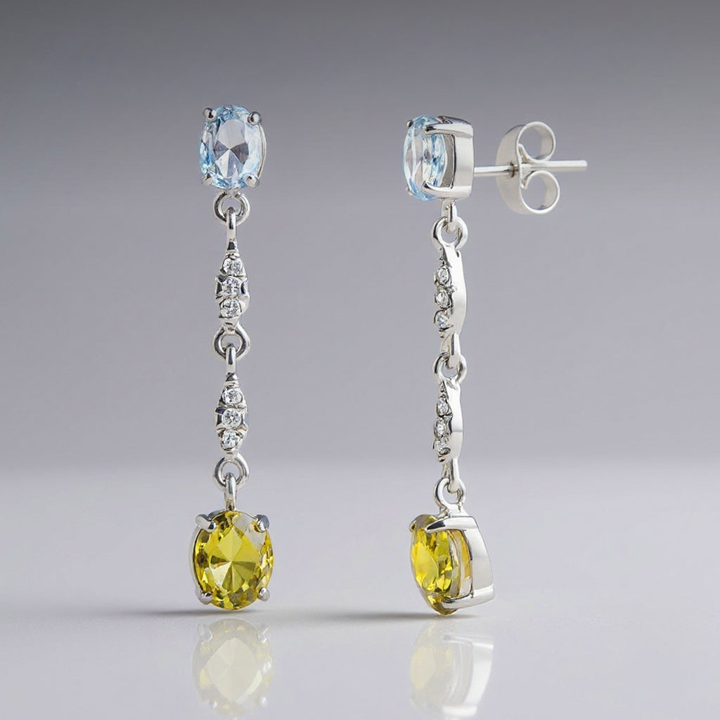 Vibrant earrings: 18 kt white gold with aquamarine and topaz