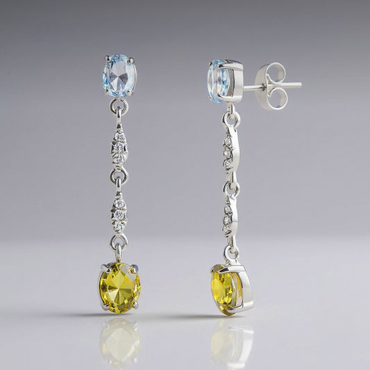 Vibrant earrings: 18 kt white gold with aquamarine and topaz