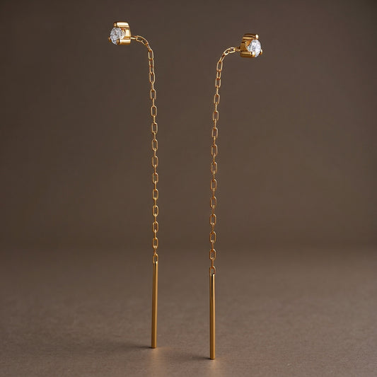 Threader long earrings: 18 kt yellow gold with zirconias