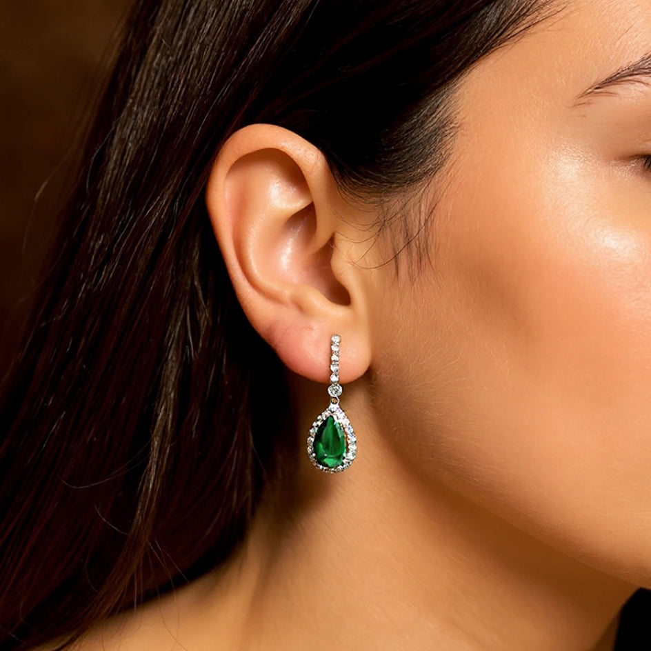 Scarlett dangle green earrings: 18 kt white gold with zirconias