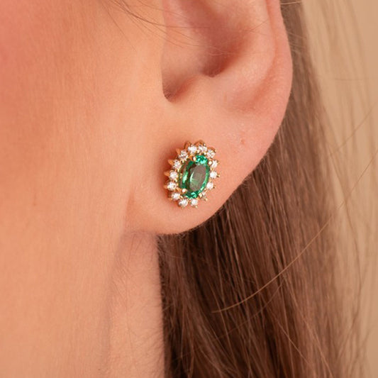 Oval emerald earrings: 18 kt yellow gold with 0,78 emeralds and 0,28ct diamonds