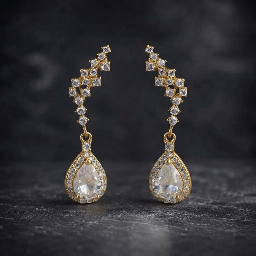 Waterfall wing earrings | 18 kt gold plated 925 sterling silver with zirconias
